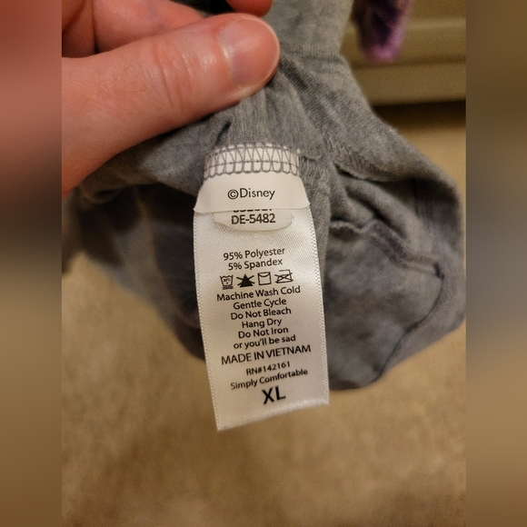 LulaRoe Disney Raglan Top featuring Purple Donald Duck Sleeves - Picture 4 of 5